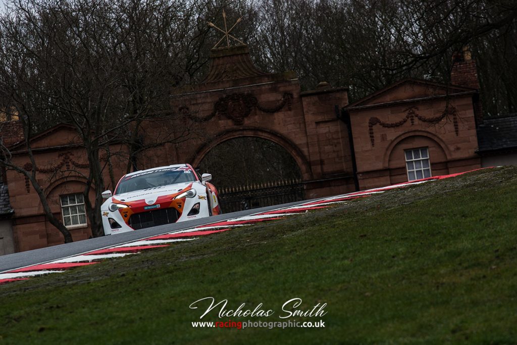 A Toyota GT8 run by GPRM at Lodge Corner on the Oulton Park International Circuit in the British GT Championship.